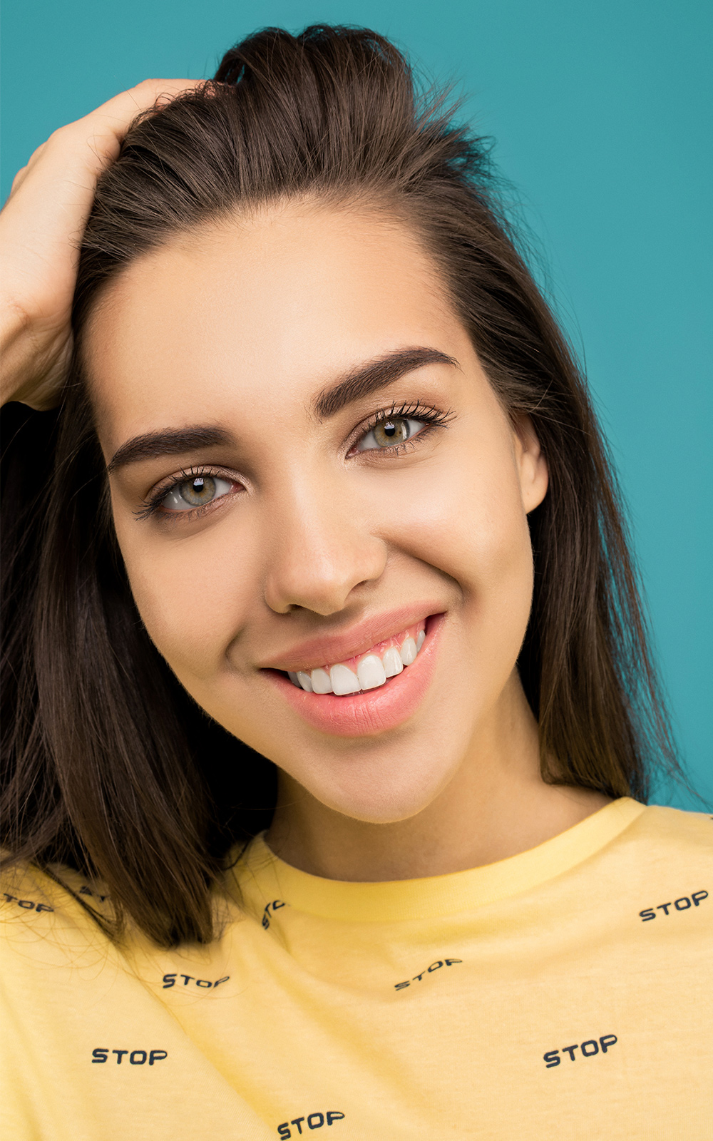 girl smiling with straight teeth