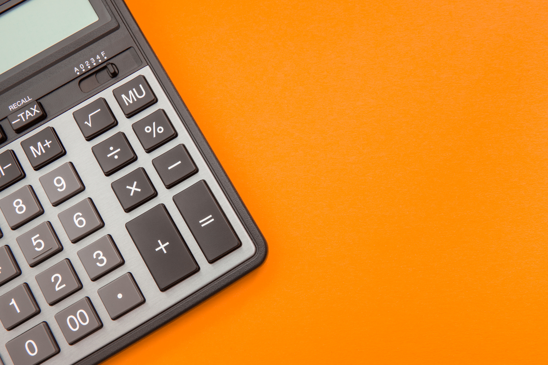 calculator on an orange background