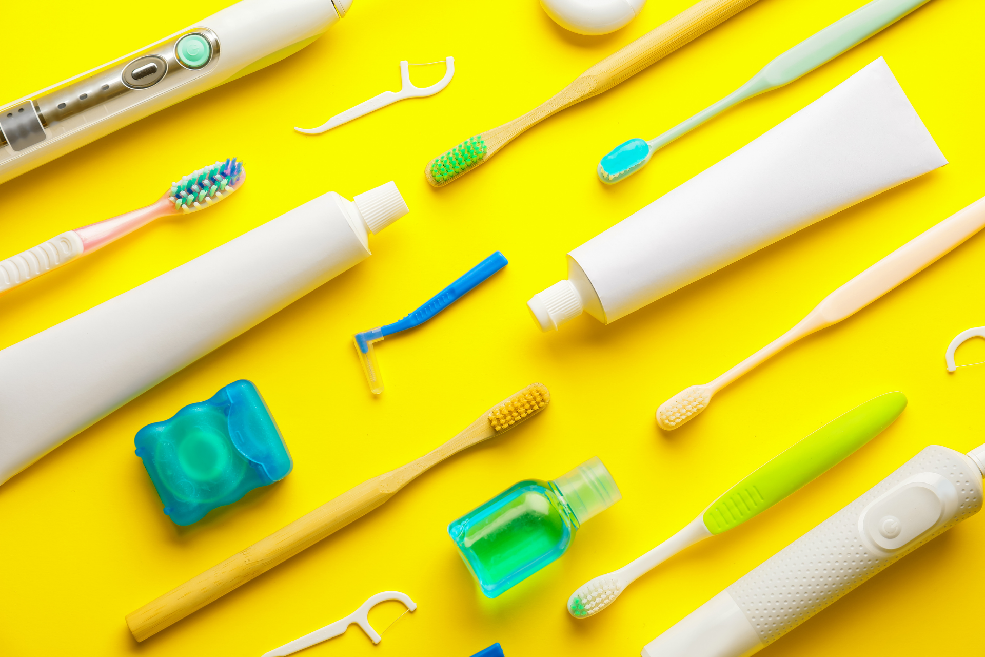 toothbrushing care kit on yellow background