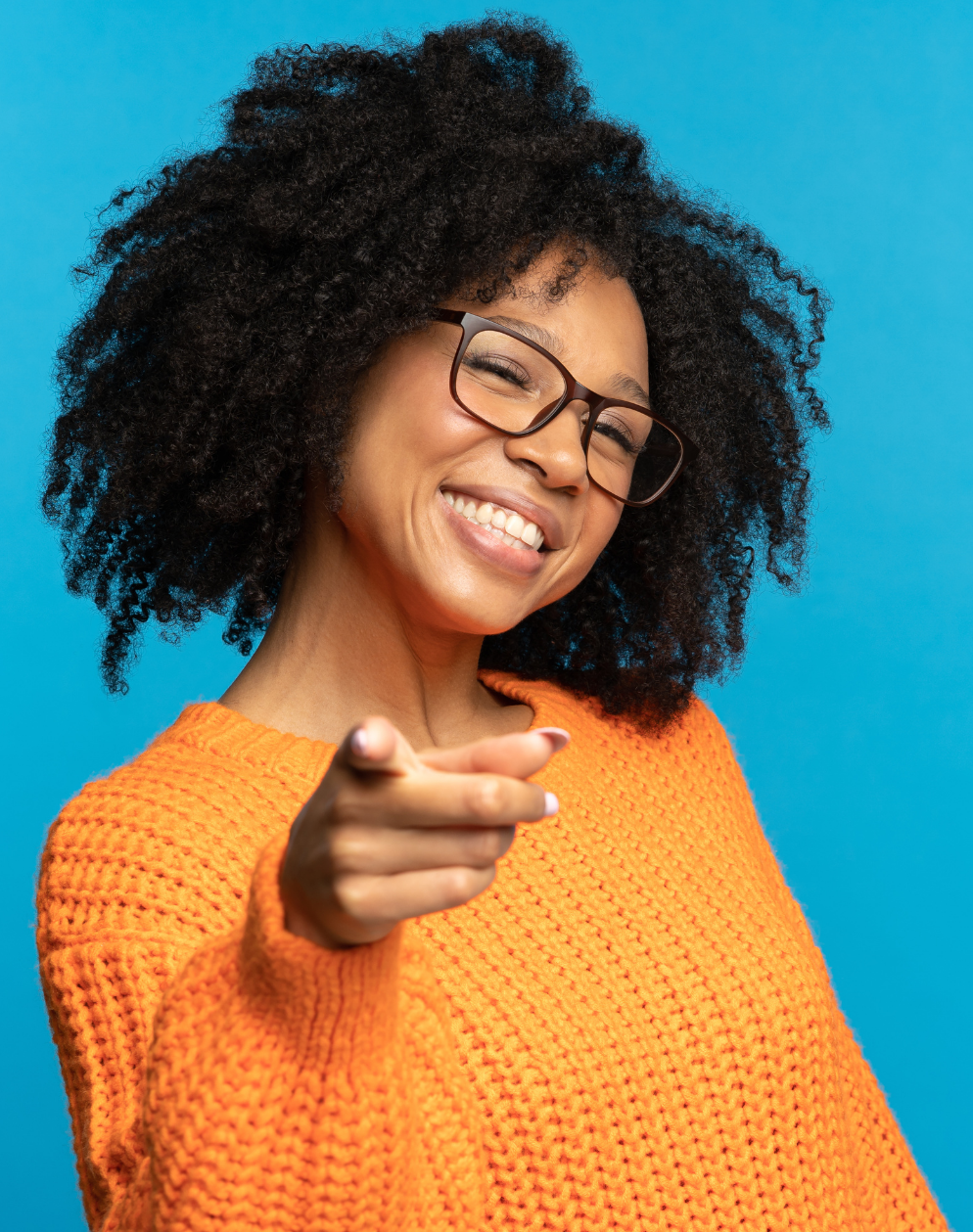 beautiful woman with happy smile pointing at camera