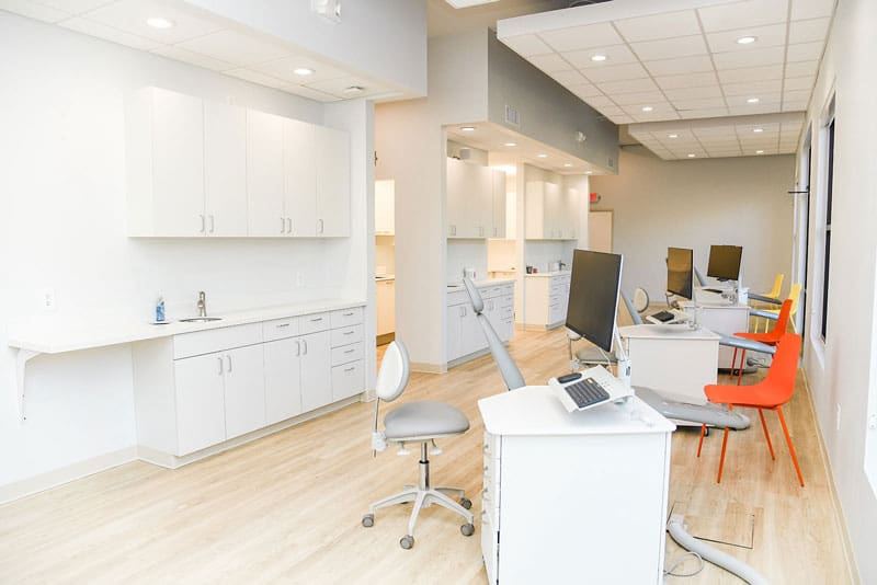 tooth-by-tooth-orthodontics-tooth-by-tooth-our-office-interior-patient-room-tech-computers-card